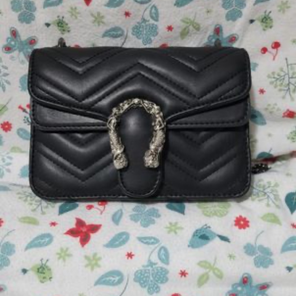 Black Quilted Shoulder Bag with Decorative Silver-Tone Buckle